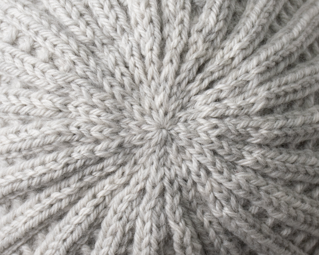 How to close the top of a knit hat
