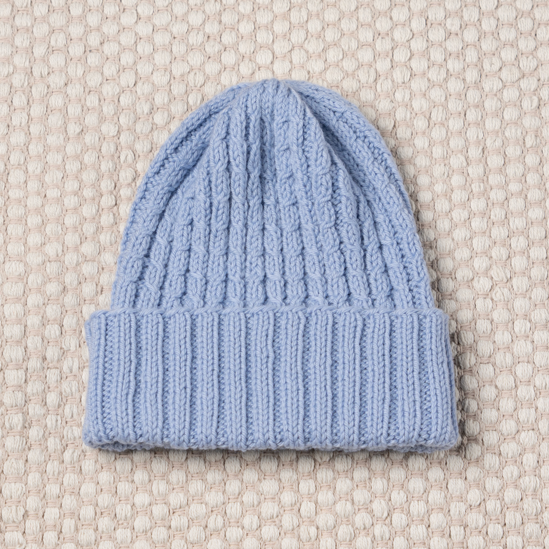 Knitted hat.